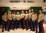 Brig. Gen. Tracy W. King (center), commanding general, 3rd Marine Logistics Group, and the Marine Security Guard Detachment Kathmandu stand in the newly dedicated 'Vengeance Hall' in the Marine House at the U.S. Embassy, Nov. 6, 2015. Six Marines, along with two Nepalese Army Liaison soldiers and five injured Nepalese civilians, lost their lives during an aircraft mishap on May 12. The Marines were conducting humanitarian assistance and disaster relief operations in support of Joint Task Force 505, during Operation Sahayogi Haat when their aircraft went down. 'Vengeance Hall' was dedicated in their honor.