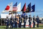 U.S. Air Force Airmen from the 18th Wing Honor Guard present the colors during the Kadena Special Olympics opening ceremony Nov. 7, 2015, at Kadena Air Base, Japan. Established by the 18th Wing commander in 2000, KSO is a wholesome sporting and entertainment event that provides an opportunity for all communities involved to stand together in support of people with special needs. (U.S. Air Force photo by Senior Airman John Linzmeier) 