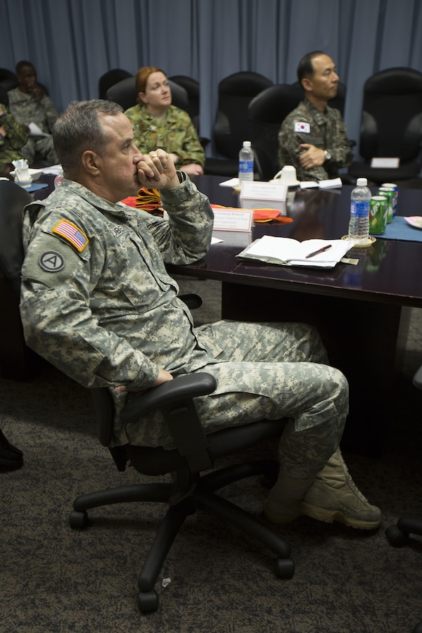 U.S. Army Maj. Gen. Kenneth Roberts listens to a presentation Nov. 5 on the capabilities and operations on Marine Corps Air Station Futenma, Okinawa, Japan. Roberts and other United Nations Command representatives were informed on future relocation plans and the capabilities of the flight line. Roberts is the wartime deputy combined rear area commander for United Nations Command.