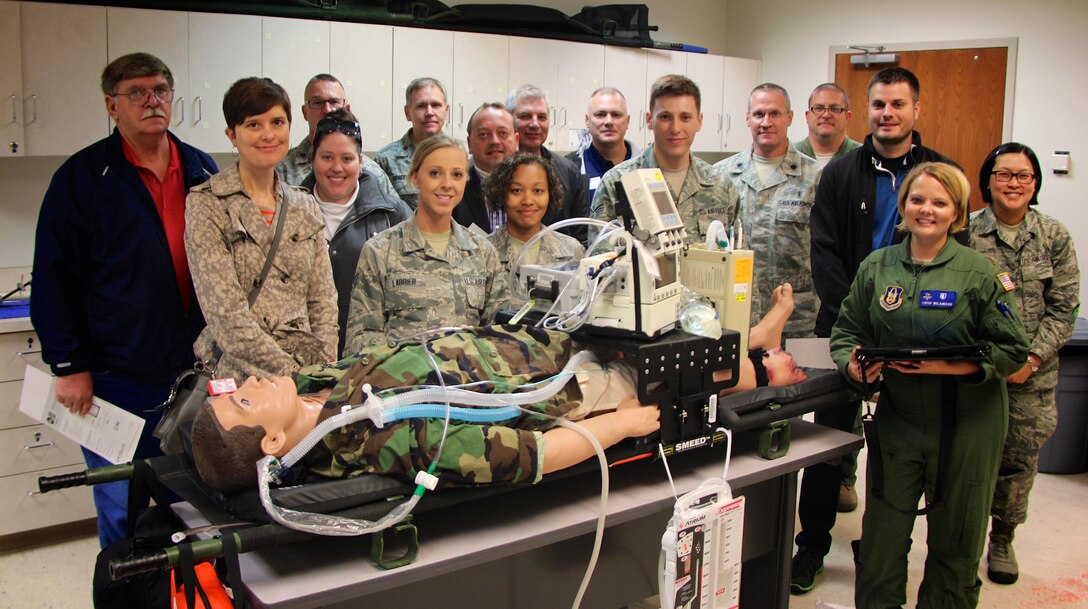 The 932nd Airlift Wing public affairs shop produced a detailed and packed Boss Day to show off the Illinois unit's people to civilian employers.  It was held during the November Unit Training Assembly to show many wing activities including a medical trauma scenario that 932nd Medical Group members performed for civilian employers at Boss Day 2015. The commander, Col. Karl Goerke, welcomed the group bright and early that morning.  In addition, they saw the Mission Support Group, Operations Group, Maintenance Group and 932nd MDS reservists who conducted a trauma demonstration which highlights the specialized training that Air Force Reserve medical personnel receive. The 932nd Airlift Wing was host to Saint Louis regional civilian employers this year on Scott Air Force Base, Ill. The 932nd AW is the only Air Force Reserve unit that flies the C-40C. (U.S. Air Force photo by Maj. Stan Paregien)