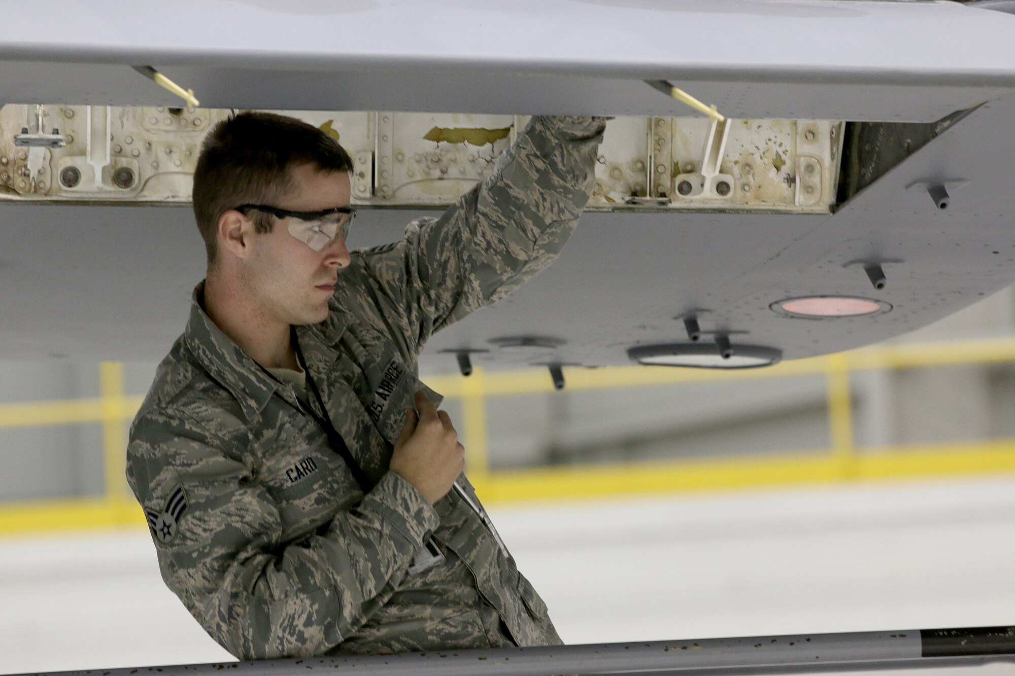 WRIGHT-PATTERSON AIR FORCE BASE, Ohio – Senior Airman Matthew Card, 445th Aircraft Maintenance Squadron crew chief, works on structural repairs on a flight control panel of a 445th Airlift Wing C-17 Globemaster III Oct. 14, 2015. (U.S. Air Force photo/Tech. Sgt. Patrick O’Reilly)