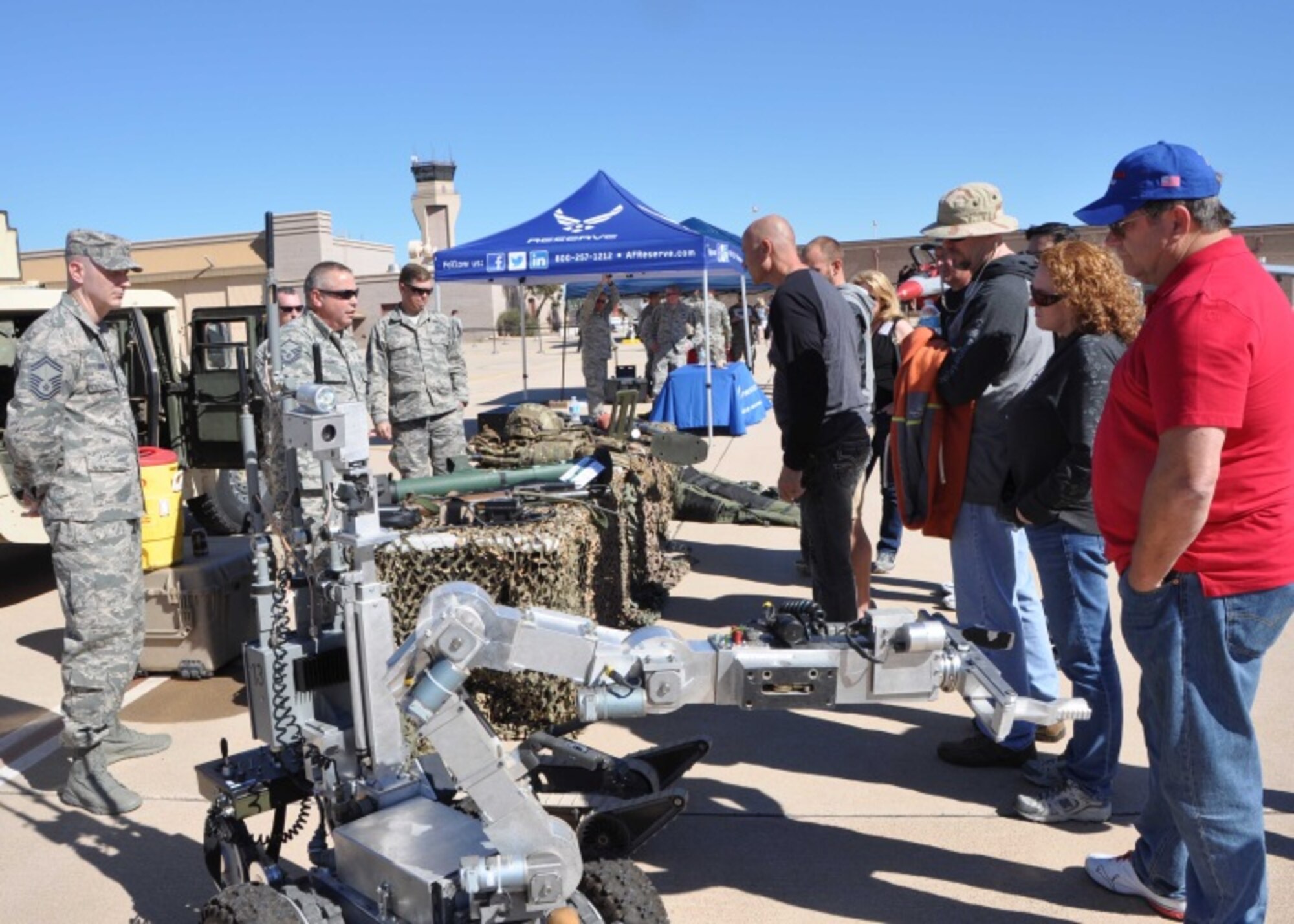 944th Civil Engineer Squadron explosive ordnance disposal members, provide an exhibit for 944th Fighter Wing Airmen civilian employers during the Boss’s Day event Nov. 7 at Luke Air Force Base, Ariz. (U.S. Air Force photo taken by Tech. Sgt. Barbara Plante)