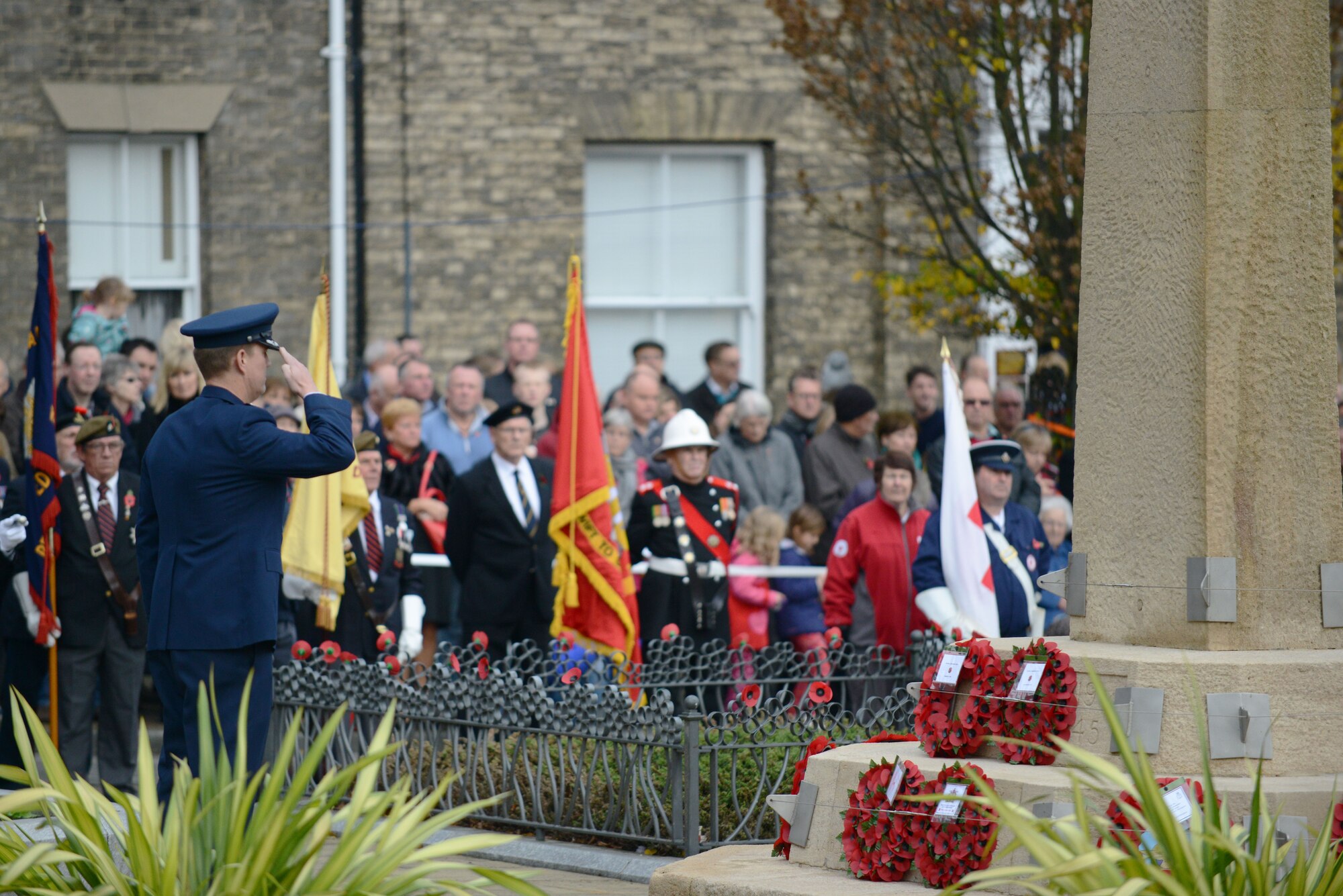U.S. Air Force Col. John Howard, 100th Air Refueling Wing vice commander, salutes during a Remembrance Day ceremony Nov. 8, 2015, in Bury St. Edmunds, England. Remembrance Day is held annually in November to honor members of the armed forces who have died in the line of duty. (U.S. Air Force photo by Staff Sgt. Richard Ware/Released)
