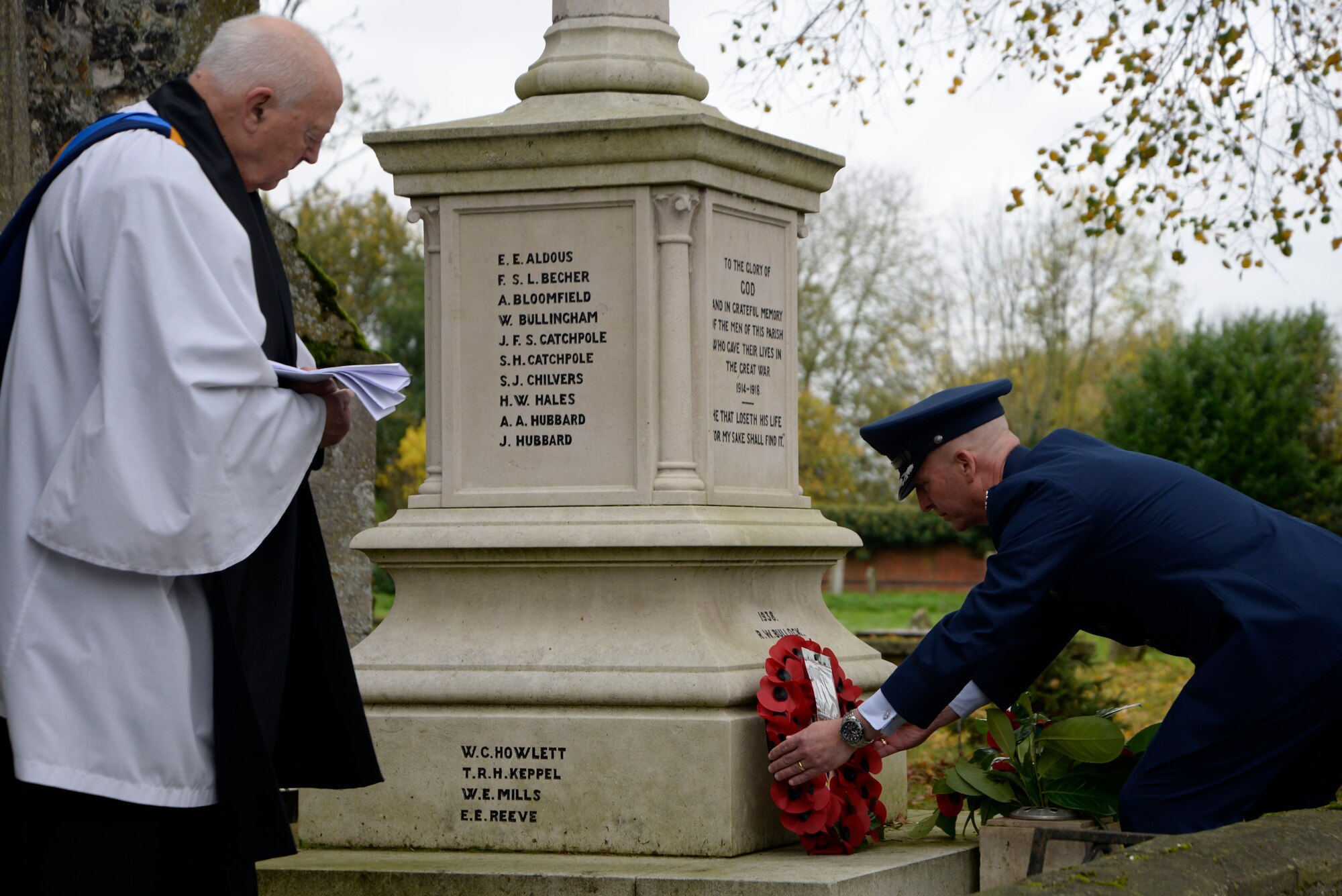 U.S. Air Force Col. Noel D. Bradford, 100th Operations Group commander, places a wreath during a Remembrance Day ceremony Nov. 8, 2015, in Dickleburgh, England. Bradford, along with several Team Mildenhall Airmen, marched in a Remembrance Day parade to honor fallen service members who came before them. (U.S. Air Force photo by Senior Airman Victoria H. Taylor/Released)