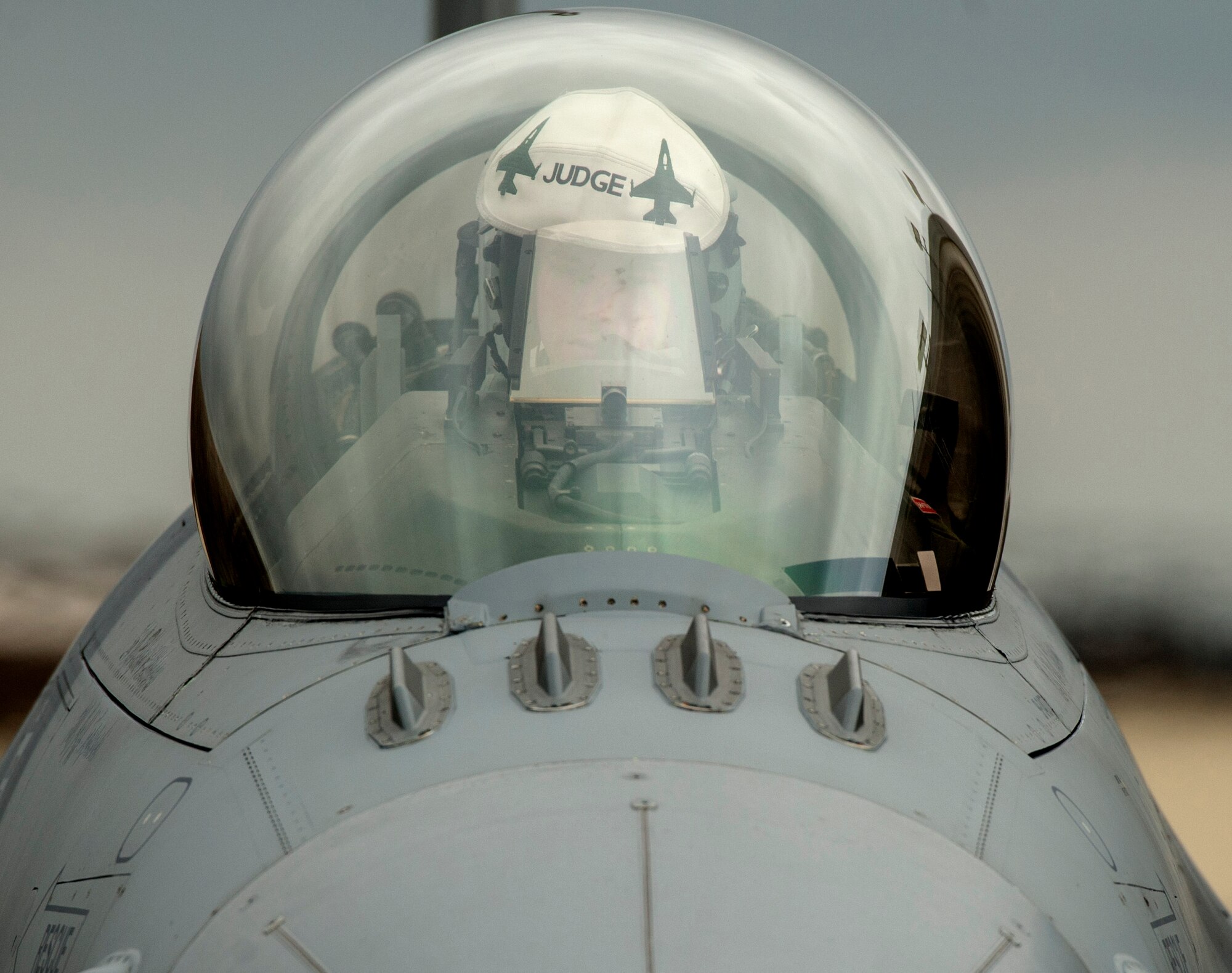 U.S. Air Force pilot assigned to the 480th Fighter Squadron parks a U.S. Air Force F-16 Fighting Falcon fighter aircraft on the flight line Nov. 6, 2015, at Spangdahlem Air Base, Germany. The F-16s are among 11 U.S. airframes that participated in Trident Juncture 2015. (U.S. Air Force photo by Senior Airman Rusty Frank/Released)