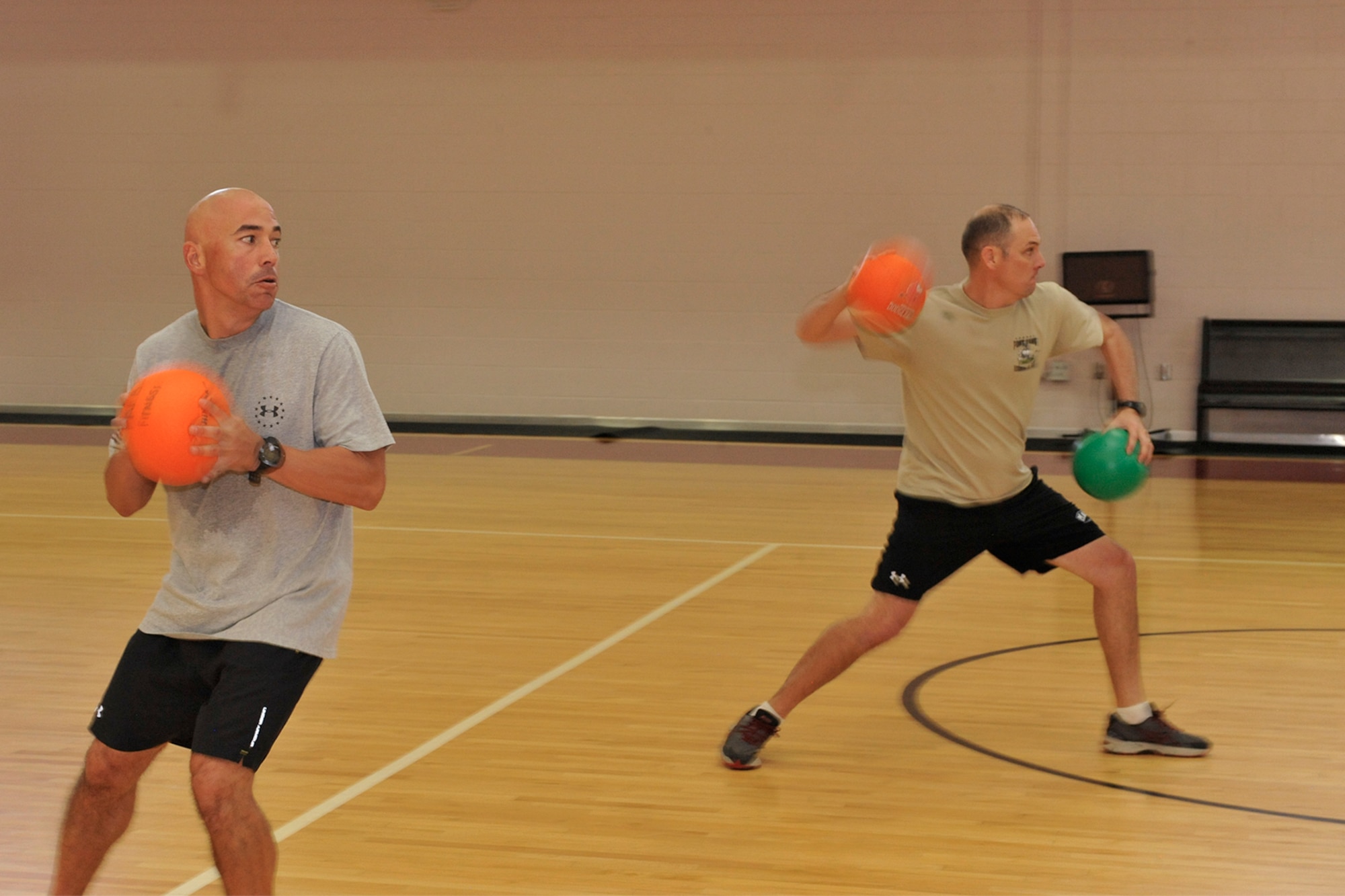 PETERSON AIR FORCE BASE, Colo. – Peterson Airmen participate in the Combined Federal Campaign dodgeball tournament at the Peterson AFB Fitness Center, Nov. 6, 2015. The dodgeball tournament took place in conjunction with a charity fair where Airmen could get more information about charities and organizations seeking donations through the CFC. (U.S. Air Force photo by Philip Carter)