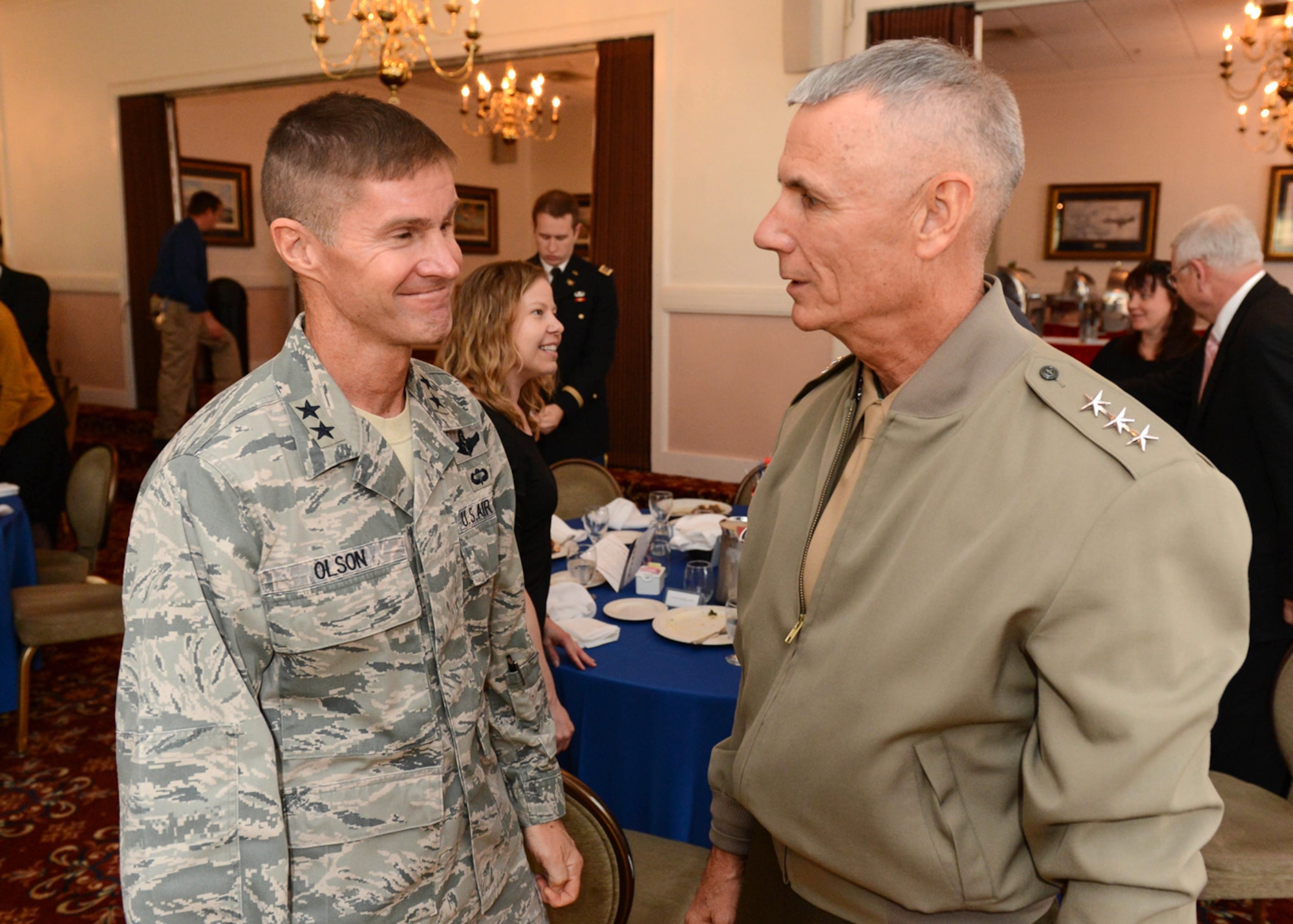 Maj. Gen. Craig Olson, C3I and Networks program executive officer, speaks with Lt. Gen. Rex McMillian, commander of Marine Forces Reserve and Marine Forces Northern Command, following the Massachusetts Institute of Technology Lincoln Laboratory’s annual Veterans Appreciation Luncheon at the Minuteman Commons Nov. 6. McMillian was the keynote speaker for the event. (U.S. Air Force photo by Jerry Saslav)