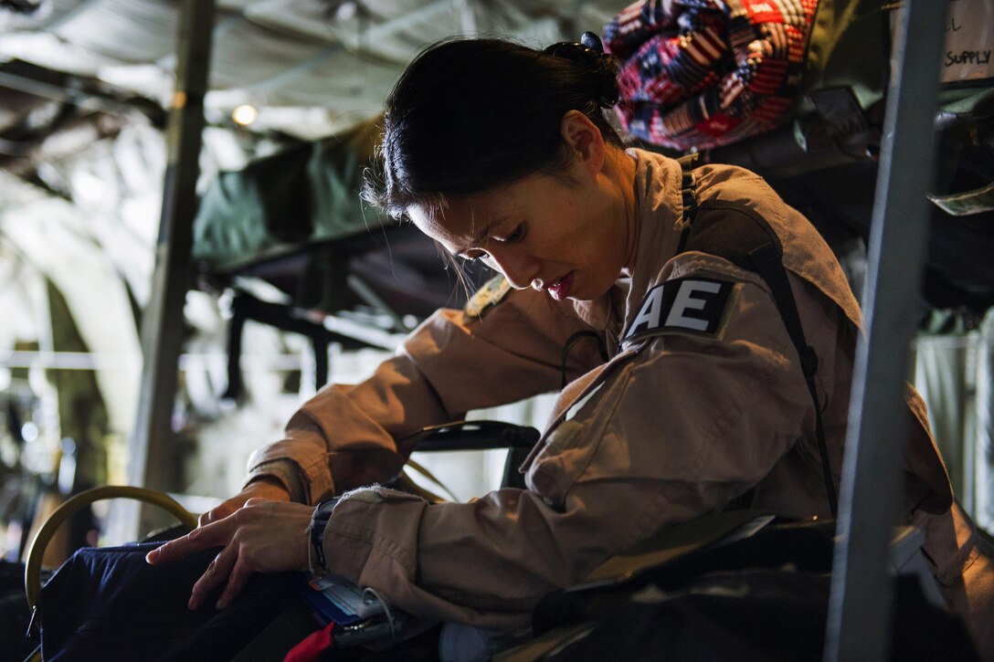 U.S. Air Force Tech. Sgt. Audrey Belmonte checks medical gear aboard a C-130 Hercules aircraft in preparation for a medevac mission on Bagram Airfield, Afghanistan, Nov. 6, 2015. Belmonte is a medical technician assigned to the 455th Expeditionary Aeromedical Evacuation Squadron. U.S. Air Force photo by Tech. Sgt. Robert Cloys