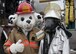 Zachariah Tucker meets Sparky while trying on the firefighter gear during the Duke Field Wing Day event Nov. 7.  The 919th Special Operations Wing sets aside a special day each year to show appreciation for its reservists and their family members. Events included music, sports, children’s games, etc. (U.S. Air Force photo/Tech. Sgt. Jasmin Taylor)