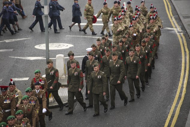 U.S. Marines with 2nd Intelligence Battalion march with British forces during a Remembrance Day Parade in Berwick-upon-Tweed, U.K., Nov. 8, 2015. The Marines partnered with various British services to honor service members who sacrificed their lives in war. (U.S. Marine Corps photo by Cpl. Lucas Hopkins/Released)