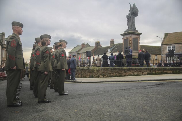 U.S. Marines with 2nd Intelligence Battalion stand at attention during a Remembrance Day Parade in Berwick-upon-Tweed, U.K., Nov. 8, 2015. Since the ending of World War I, the United Kingdom has celebrated the holiday, which honors service members who sacrificed their lives in war. (U.S. Marine Corps photo by Cpl. Lucas Hopkins/Released)