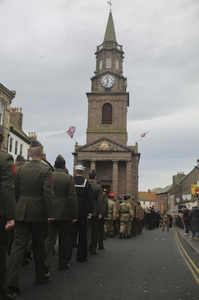 U.S. Marines with 2nd Intelligence Battalion march with British forces during a Remembrance Day Parade in Berwick-upon-Tweed, U.K., Nov. 8, 2015. The Marines partnered with various British services to honor service members who sacrificed their lives in war. (U.S. Marine Corps photo by Cpl. Lucas Hopkins/Released)