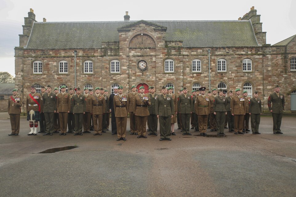 U.S. Marines with 2nd Intelligence Battalion pose for a photo with British soldiers following a Remembrance Day Parade in Berwick-upon-Tweed, U.K., Nov. 8, 2015. The Marines gathered with various British armed services to commemorate the holiday, which honors service members who sacrificed their lives in war. The forces concluded Exercise Phoenix Odyssey with British soldiers Nov. 6, which was designed to enhance joint intelligence operations. (U.S. Marine Corps photo by Cpl. Lucas Hopkins/Released)
