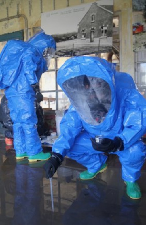 RELEGEM, Belgium - Soldiers from the 773rd Civil Support Team employ sophisticated gear to determine contaminants during a hazardous material scenario at CBRN Week 2015. (Photo by Staff. Sgt. Rick Scavetta, 7th Mission Support Command)