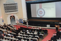 Tech. Sgt. Stephanie West, Joint Base San Antonio Master Resiliency Trainer, addresses the audience during Wingman Resiliency Day Nov. 6, 2015 at Joint Base San Antonio-Randolph. Members of the 502nd Air Base Wing at JBSA-Randolph broke from daily operations and missions to reinforce the Wingman concept and provide a foundation for building resilient Airmen with team building exercises in the form of a sporting, recreational, and process improvement events. (U.S. Air Force photo by Melissa Peterson)
