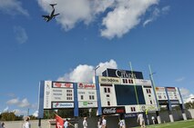 An Air Force Reserve aircrew consisting seven graduates of The Citadel flew over the Bulldogs Homecoming Military Classic of the South game against the Virginia Military Institute Keydets in Charleston, S.C. Nov. 7. The 701st Airlift Squadron “Turtles” flight crew performed the flyover of Johnson Hagood Stadium in a Joint Base Charleston C-17 Globemaster III as part of a local training mission. (U.S. Air Force photo by Staff Sgt. Bobby Pilch)