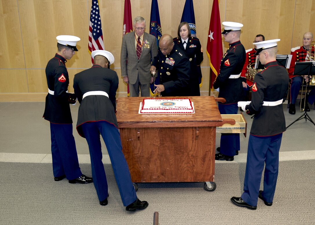 DIA Director LtGen Vincent Stewart, USMC,  cuts the cake at the celebration of the 240th birthday of the United States Marine Corps at DIA HQ in Washington, DC.