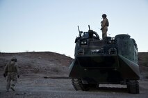 U.S. 1st Marine Division, Alpha Company, 3D Amphibious Assault Battalion conducts their Amphibious Assault Vehicle qualifications tables 1-9 for the first time at Yuma Proving Grounds, Ariz., on Nov. 6, 2015.  Alpha Company is conducting this training in preparation for future deployments. (U.S. Marine Corps photo taken by LCpl. AaronJames B. Vinculado/Released)