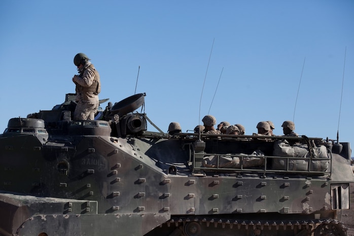 U.S. 1st Marine Division, Alpha Company, 3D Amphibious Assault Battalion conducts their Amphibious Assault Vehicle qualifications tables 1-9 for the first time at Yuma Proving Grounds, Ariz., on Nov. 7, 2015.  Alpha Company is conducting this training in preparation for future deployments. (U.S. Marine Corps photo taken by LCpl. AaronJames B. Vinculado/Released)