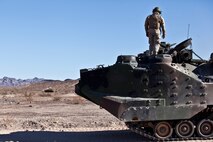 U.S. 1st Marine Division, Alpha Company, 3D Amphibious Assault Battalion conducts their Amphibious Assault Vehicle qualifications tables 1-9 for the first time at Yuma Proving Grounds, Ariz., on Nov. 7, 2015.  Alpha Company is conducting this training in preparation for future deployments. (U.S. Marine Corps photo taken by LCpl. AaronJames B. Vinculado/Released)