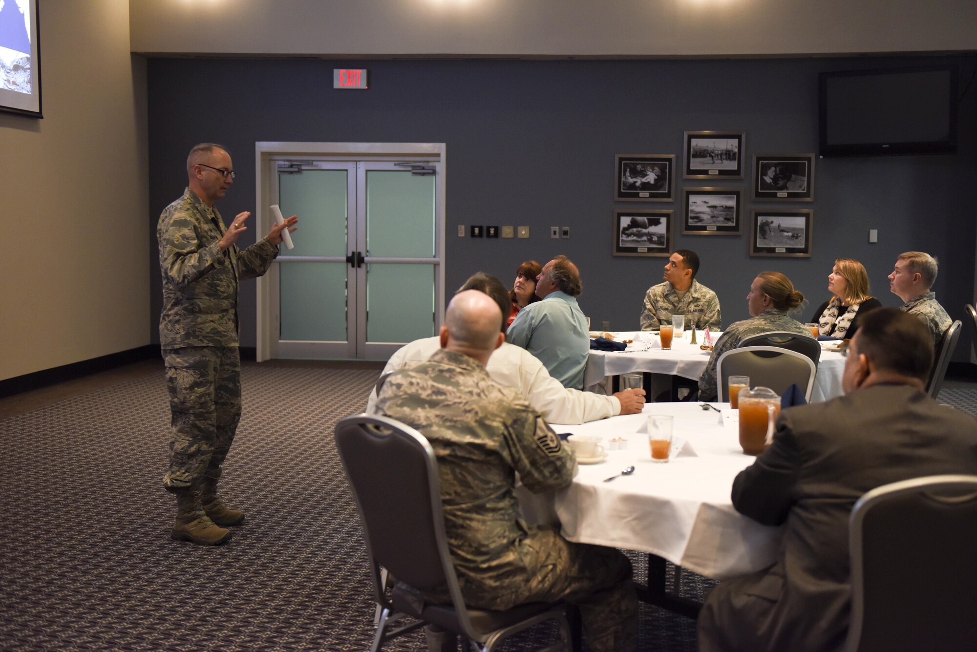 U.S. Air Force Col. Michael L. Downs, 17th Training Wing Commander, briefs the Honorary Commanders during the Honorary Commanders Luncheon at the Event Center on Goodfellow Air Force Base, Texas, Nov. 5, 2015. Downs talked about the wing’s mission and community events. (U.S. Air Force photo by Airman Chase Sousa/Released)