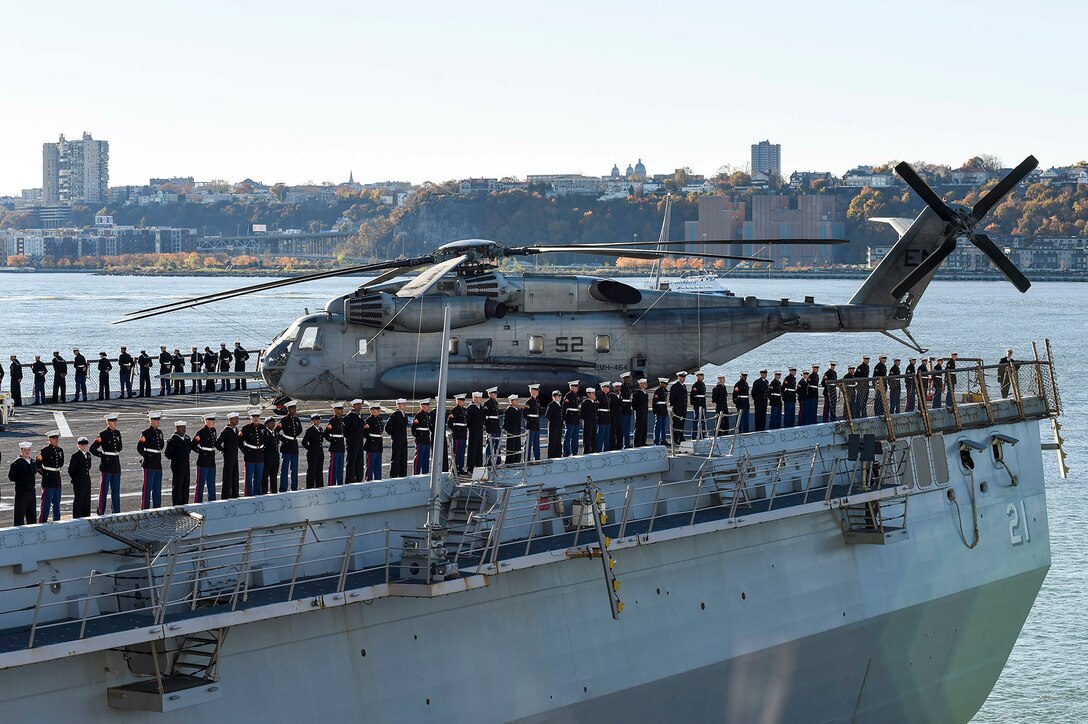 Sailors and Marines man the rails as the amphibious landing dock ship USS New York pulls into port in New York City, Nov. 8, 2015. 
U.S. Navy photo by Petty Officer 1st Class Brian McNeal