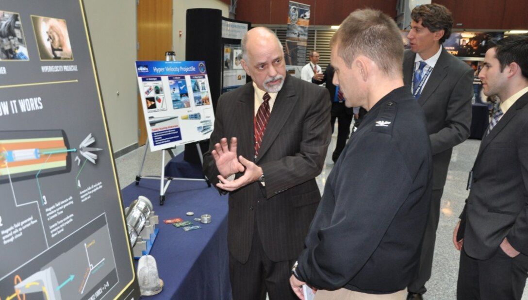 Charles Garnett, NSWCDD electromagnetic railgun system engineer, explains how electricity can launch railgun projectiles at seven times the speed of sound.
The electromagnetic railgun is a long-range weapon that launches projectiles using electricity instead of chemical propellants and is under development by the Department of the Navy for use aboard ships. 
