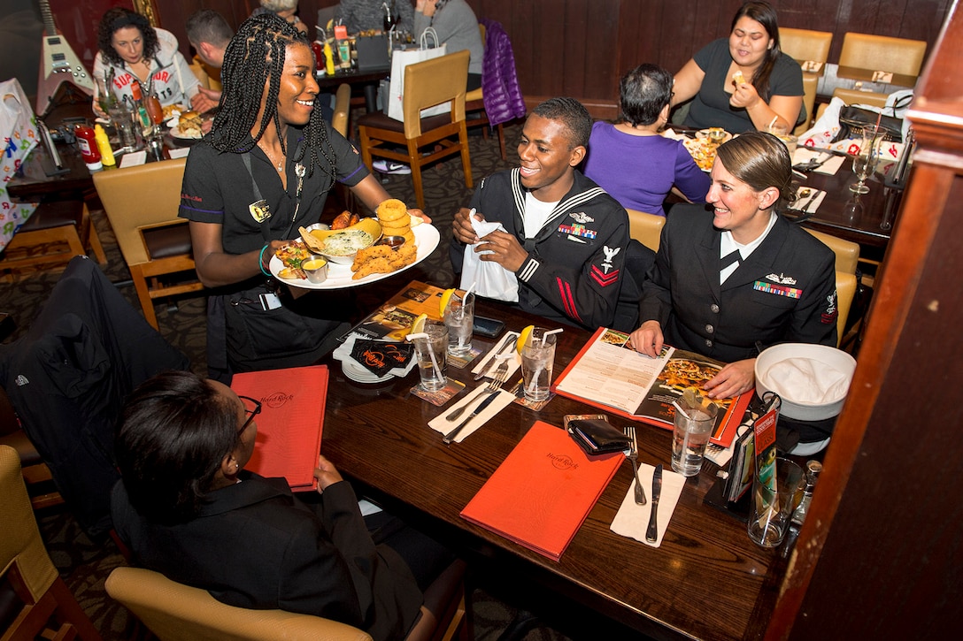 Sailors enjoy lunch at the Hard Rock Cafe in Times Square during Veterans Week New York City, Nov. 9, 2015. U.S. Navy photo by Petty Officer 1st Class Brian McNeal