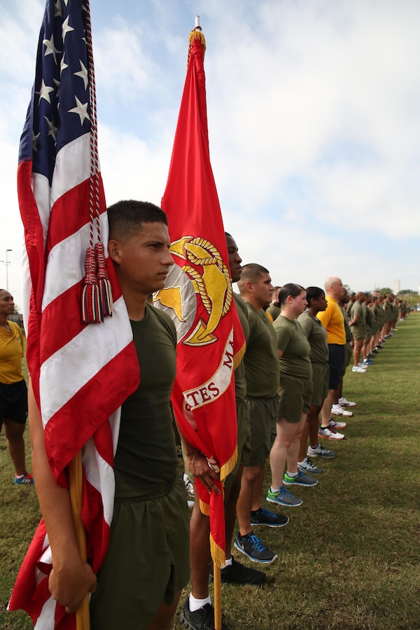 The Marines of Marine Forces Reserve stand at parade rest at the Marine Corps Support Facility New Orleans after their motivational run through Algiers Point, La., Nov. 10, 2015. The Marines completed a 3-mile formation run through the neighborhood, after the traditional cake-cutting ceremony in honor of the Marine Corps’ 240th birthday. Since Nov. 10, 1775, the United States Marine Corps has garnered the reputation as the world’s most efficient amphibious fighting force, engaging in combat on battlefronts across the globe since its inception. 