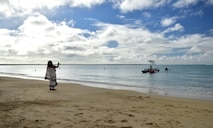 Canoes carrying Lono, a representation of the ancient Hawaiian diety Lono, or god of Makahiki, are invited ashore at Hickam Beach during JBPHH's annual Makahiki event, held Nov. 7, 2015, at Hickam Harbor Beach on Joint Base Pearl Harbor-Hickam. The Makahiki, known as a "Hawaiian Thanksgiving," provided an opportunity for military families to appreciate and learn more about the culture and history of Hawaii. (U.S. Air Force photo by Staff Sgt. Christopher Stoltz/Released)
