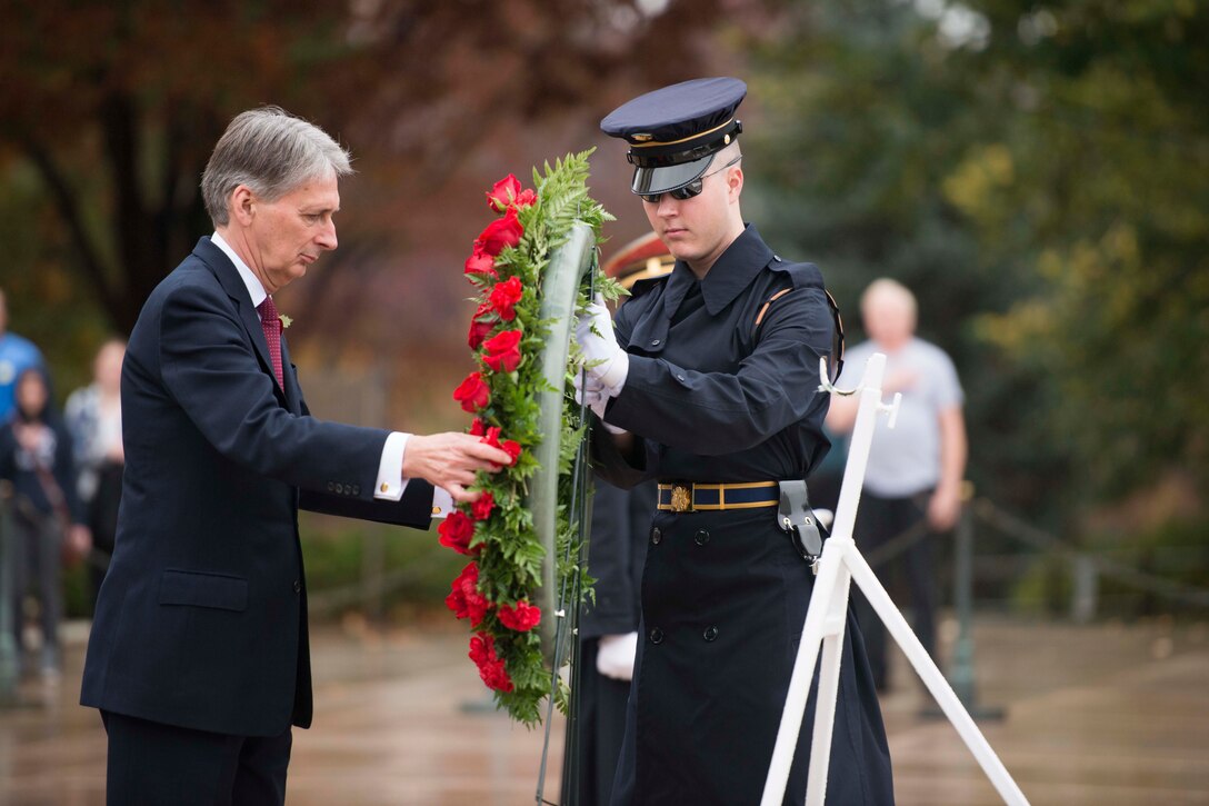 British Foreign Secretary Philip Hammond lays a wreath at the Tomb of the Unknown Soldier in Arlington National Cemetery, Arlington, Va., Nov. 10, 2015. U.S. Army photo by Rachel Larue