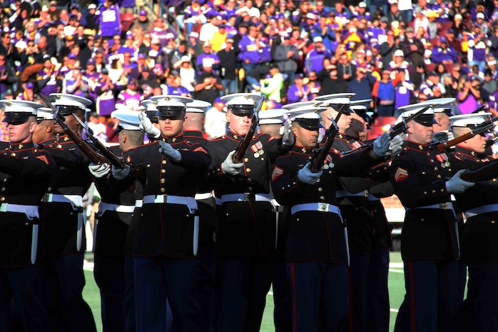 Marines with the Silent Drill Platoon performed at the MN Vikings game, November 8. In addition to performing a spectacular half-time show, the Marines also honored Tyler Johnson, a high school student from Minneapolis, selected to play in the Semper Fi All American Bowl. 