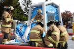 U.S. Air Force Airmen assemble a decontamination chamber during an exercise at Misawa Air Base, Japan, Nov. 3, 2015. Exercise Vigilant Ace 16 prompted the scenario of a suspicious package at the post office, setting off the response of emergency agencies on base. Individuals at the scene were cleansed of any potential chemical remains. 