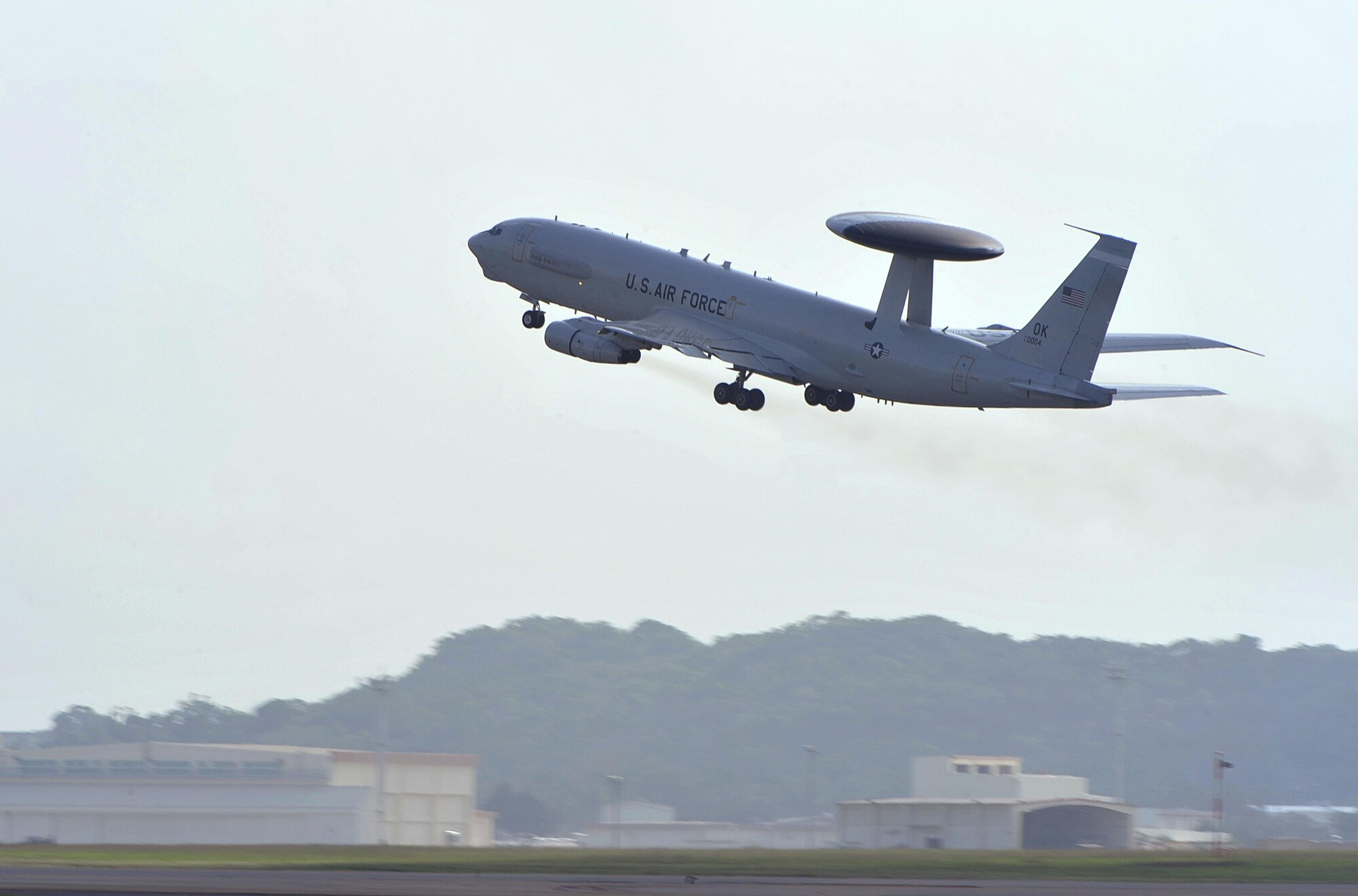 An E-3 Sentry airborne warning and control system from the 961st Airborne Air Control Squadron takes off from Kadena on a daily basis to help maintain strategic access and freedom of movement across all domains, Nov. 10, 2015, at Kadena Air Base, Japan. The AWACS aircraft provides all-weather surveillance, command, control and communications needed by commanders of U.S., NATO and other allied air defense forces. (U.S. Air Force photo by Naoto Anazawa/Released)