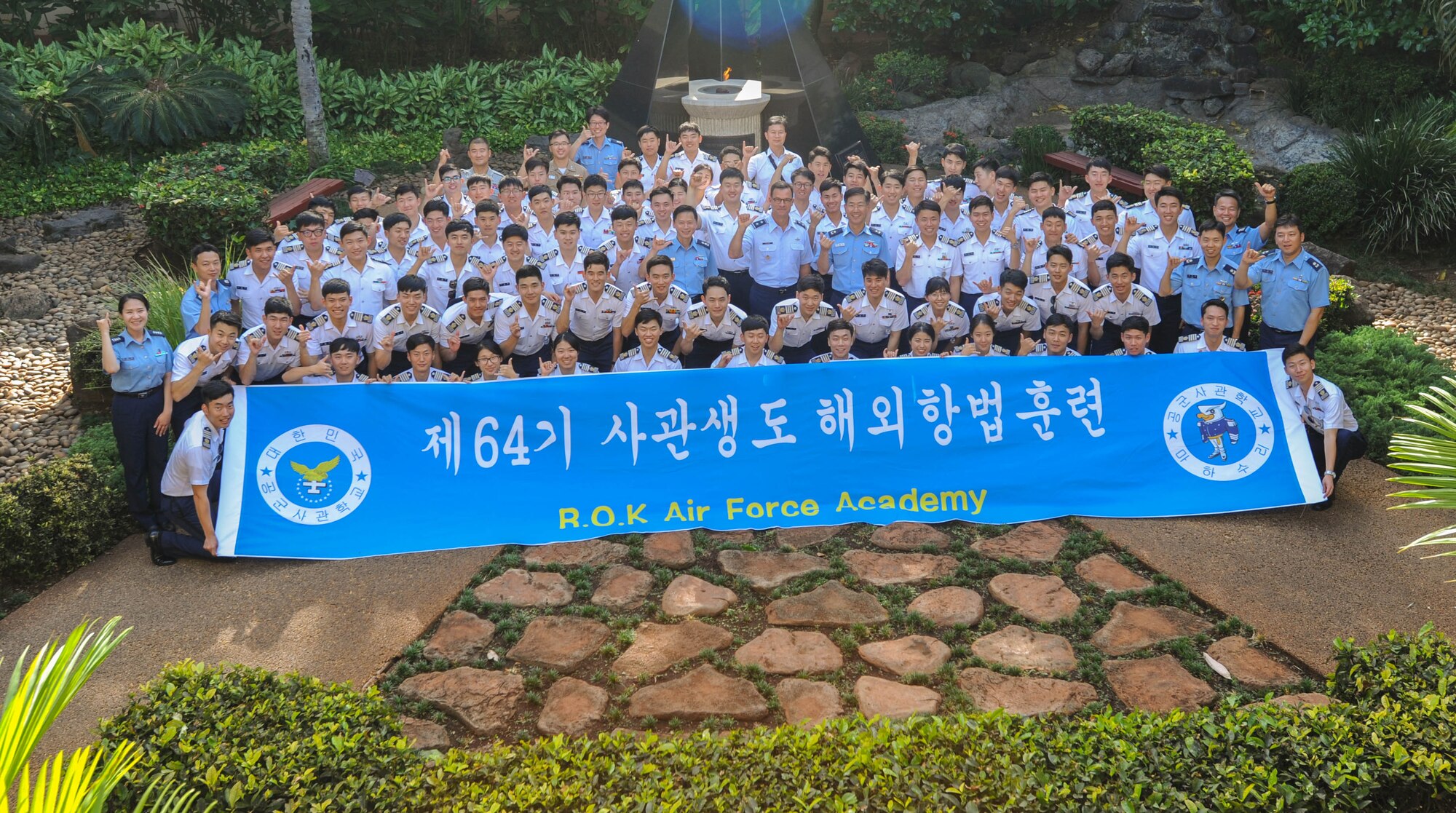 Republic of Korea Air Force Academy cadets take a photo with U.S. Air Force Maj. Gen. Mark Dillon, Pacific Air Forces vice commander, Nov. 10, 2015, Joint Base Pearl Harbor-Hickam, Hawaii. The cadet's visit was part of an effort to build a foundation of partnership and interoperability between Headquarters PACAF and future ROKAF leaders. (U.S. Air Force photo by Tech. Sgt. Amanda Dick/Released)