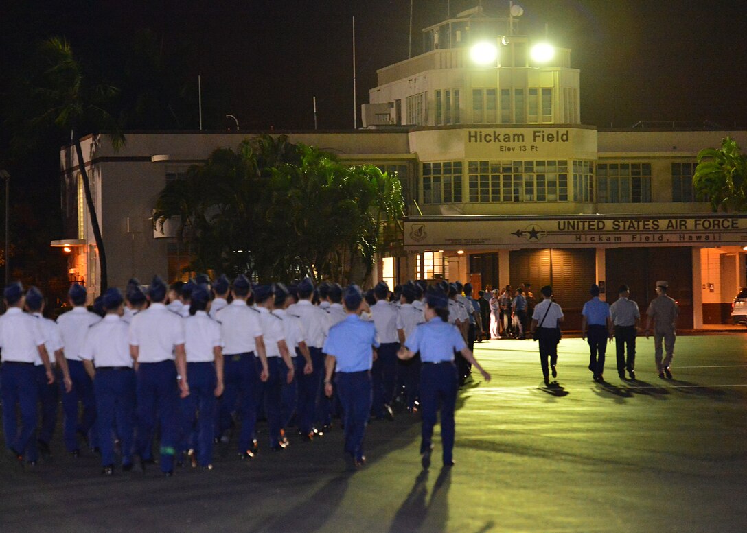Republic of Korea Air Force Academy Cadets make their way towered the historic operations building on Joint Base Pearle Harbor-Hickam, Hawaii, Nov. 10, 2015. This is the first ever visit by the ROKAF academy cadets to Hawaii. This visit is designed to strengthen the alliance between the U.S. and ROK’s future leaders. (U.S. Air Force photo by Tech. Sgt. Aaron Oelrich/Released)