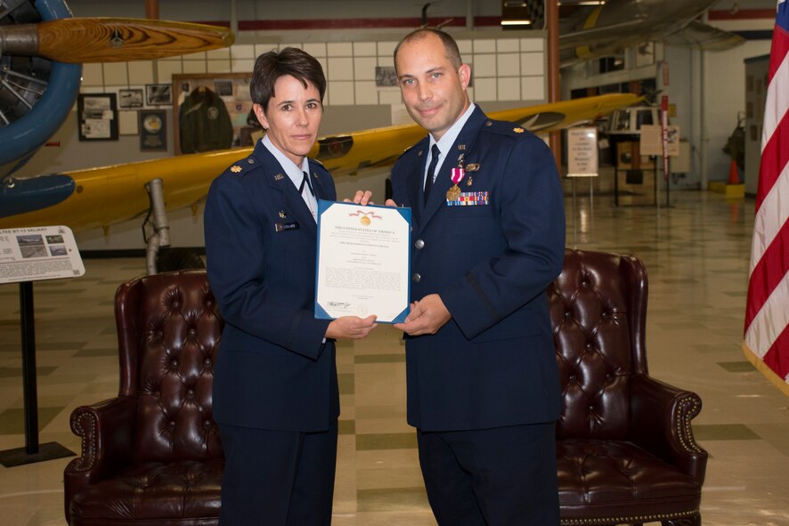TRAVIS AIR FORCE BASE, Calif. -- Maj. Raymond Stercl, 349th Force Support Squadron manpower and personnel flight commander, retires after 20 years of service in the United States Air Force Reserves Nov. 7, 2015 at Travis Air Force Base, Calif. (U.S. Air Force photo/Airman 1st Class Shelby R. Horn)