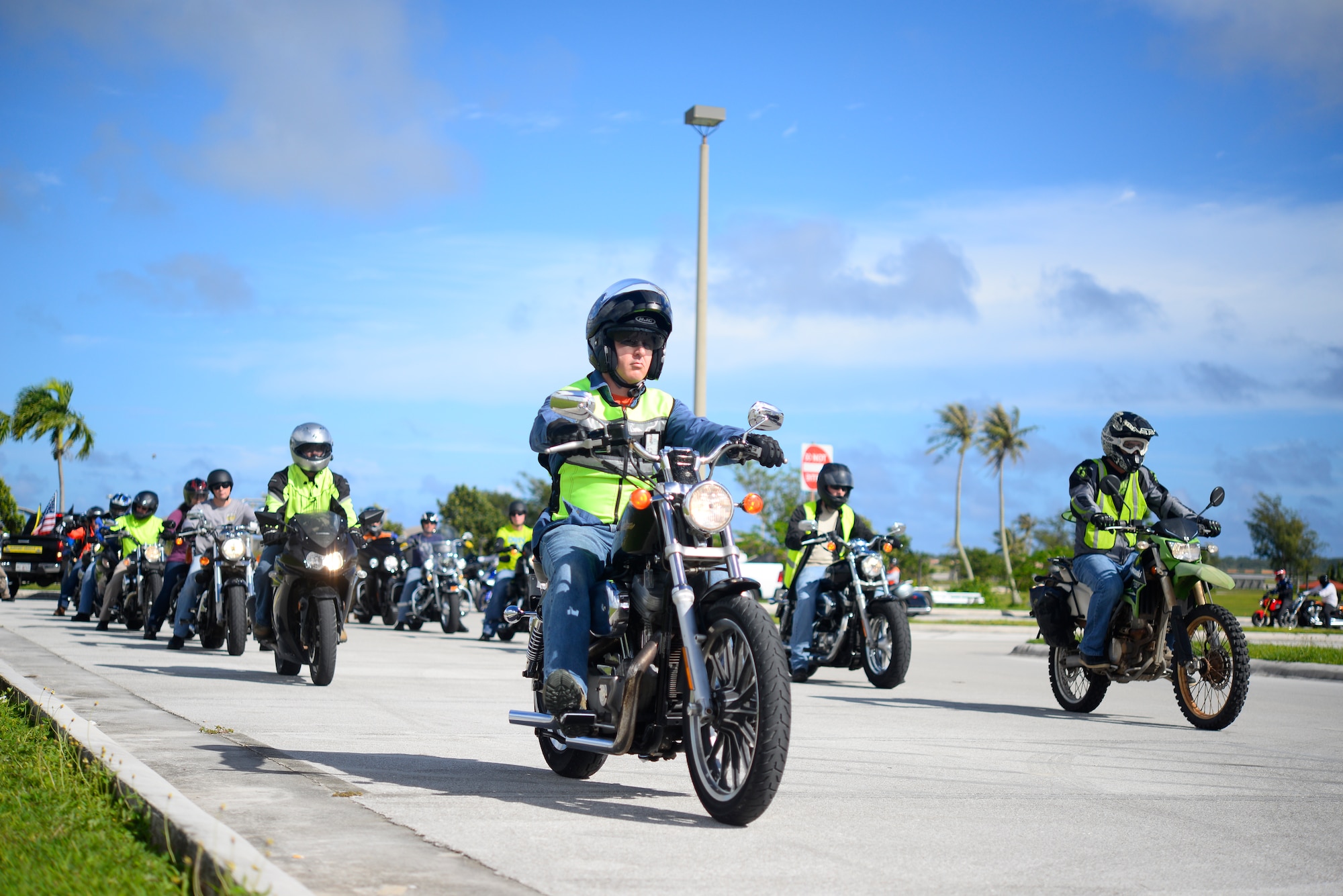 U.S. Air Force and Navy motorcyclists begin a mentorship ride Nov. 6, 2015, at Andersen Air Force Base, Guam. Riders used the opportunity to check personal protective equipment and hone safe group riding practices. (U.S. Air Force photo by Staff Sgt. Alexander W. Riedel/Released) 
