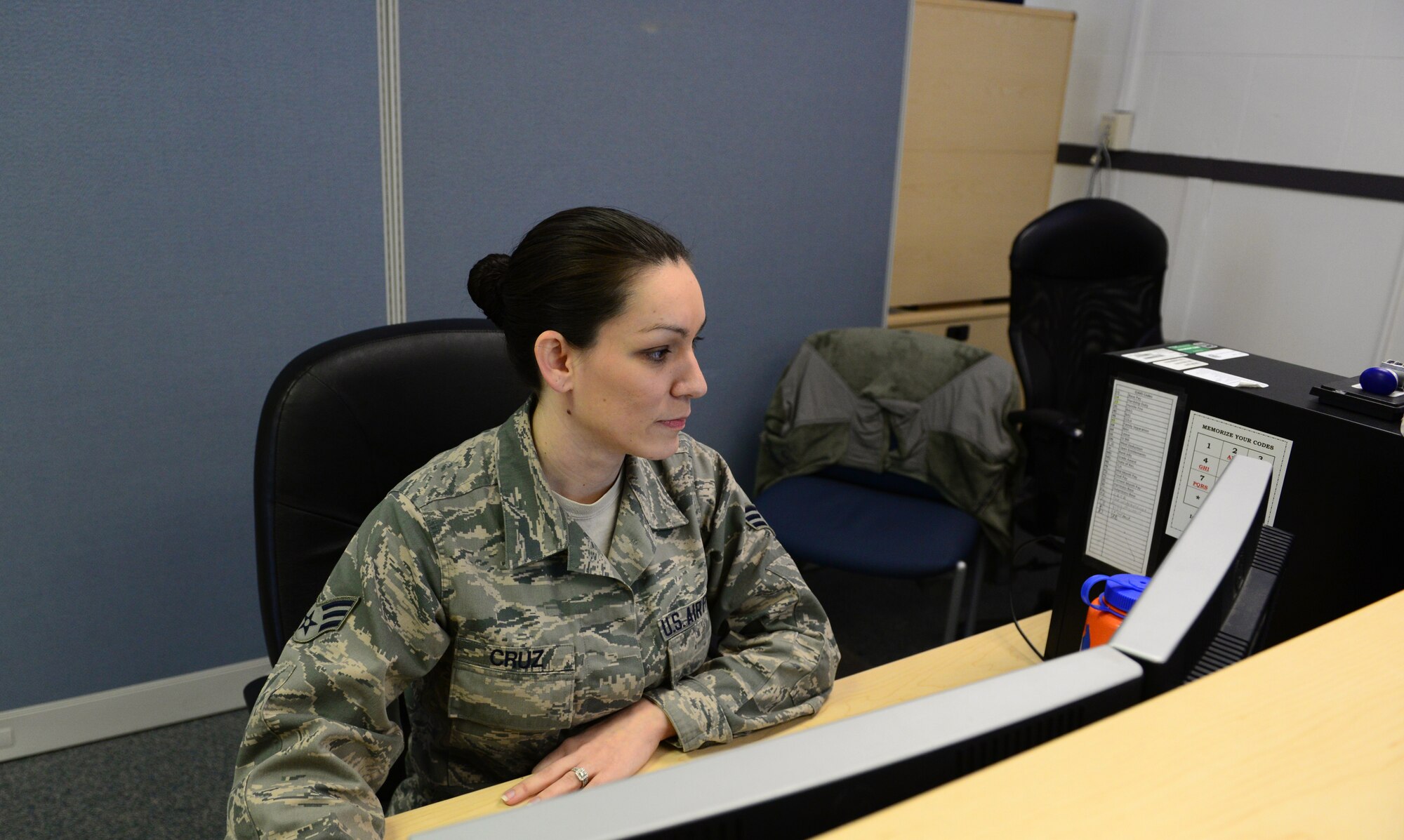 U.S. Air Force Senior Airman Tiffinie Cruz, a 354th Comptroller Squadron budget analyst and separation technician, goes over spreadsheets Nov. 9, 2015, at Eielson Air Force Base, Alaska. The spreadsheets are used to help determine the base budget. (U.S. Air Force photo by Airman 1st Class Cassandra Whitman/Released)