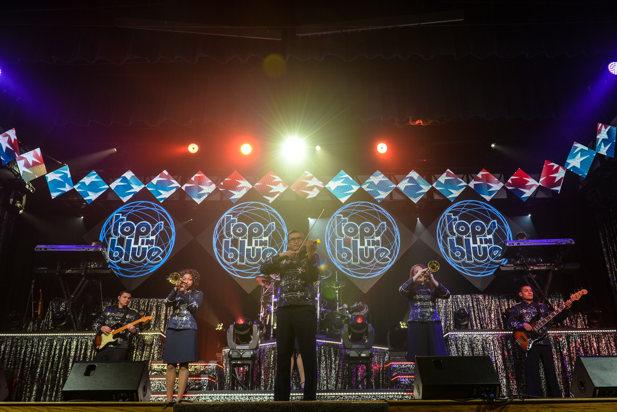 Members of Tops in Blue perform during a show Nov. 6, 2015, in the Ernie Walker Theater at Eielson Air Force Base, Alaska. Tops in Blue’s primary purpose is to perform for military personnel and their families. (U.S. Air Force photo by Staff Sgt. Joshua Turner/Released)