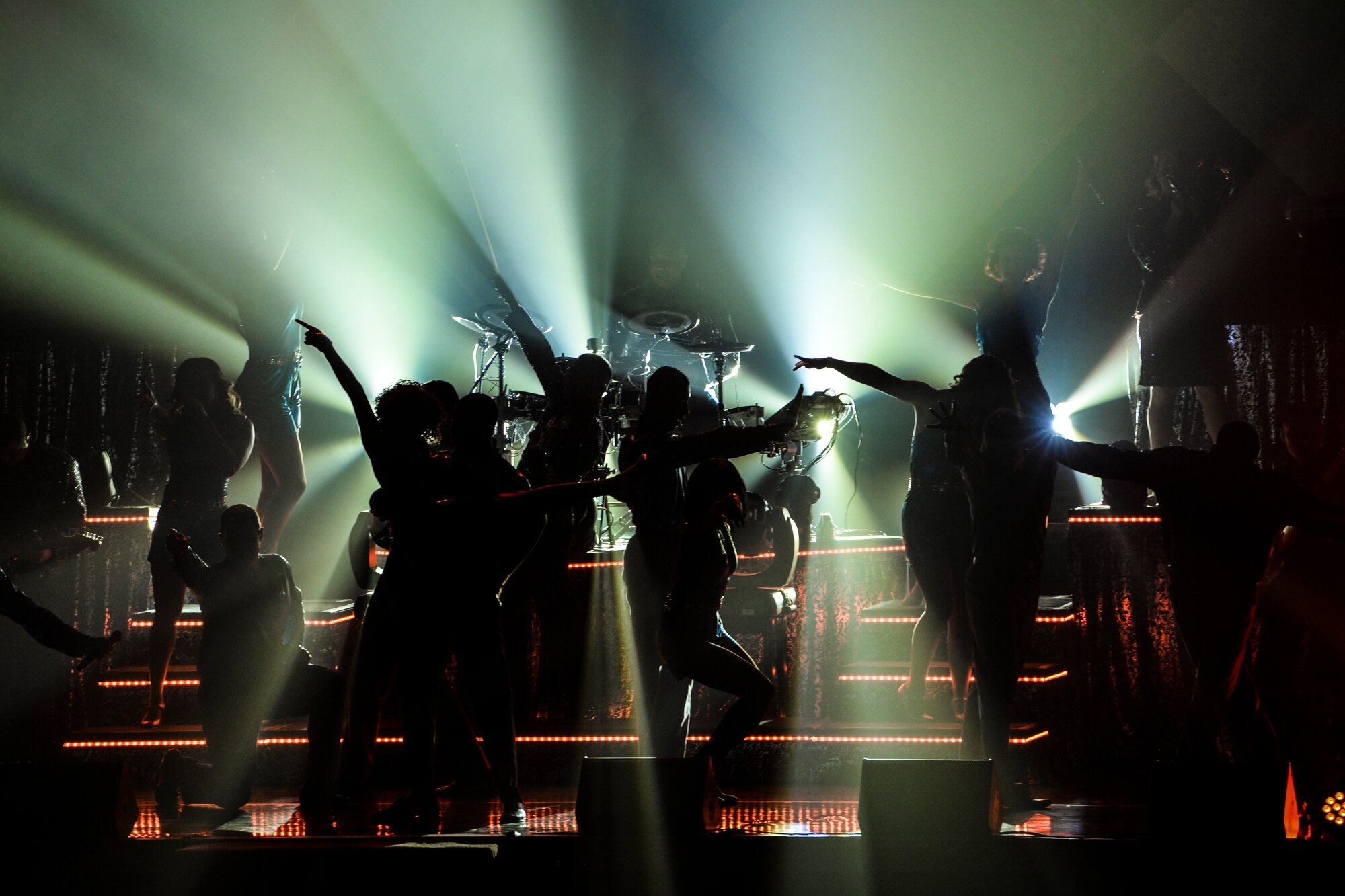 Members of Tops in Blue perform during a show Nov. 6, 2015, in the Ernie Walker Theater at Eielson Air Force Base, Alaska. Tops in Blue’s history spans nearly six decades, and since its first world tour in 1953, the group has traveled to countless locations to boost morale and support Airmen and their families. (U.S. Air Force photo by Staff Sgt. Joshua Turner/Released)