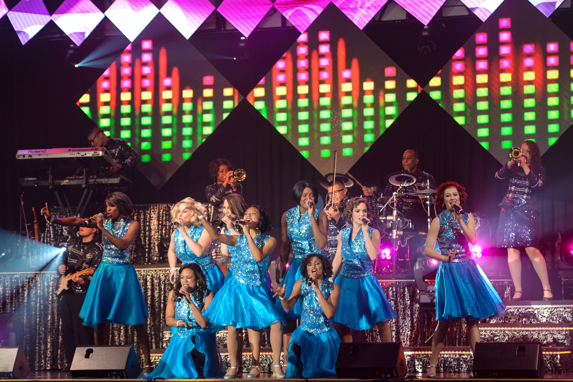 Members of Tops in Blue perform during a show Nov. 6, 2015, in the Ernie Walker Theater at Eielson Air Force Base, Alaska. Tops in Blue is comprised of Air Force members from different career fields who perform around the world. (U.S. Air Force photo by Staff Sgt. Joshua Turner/Released)
