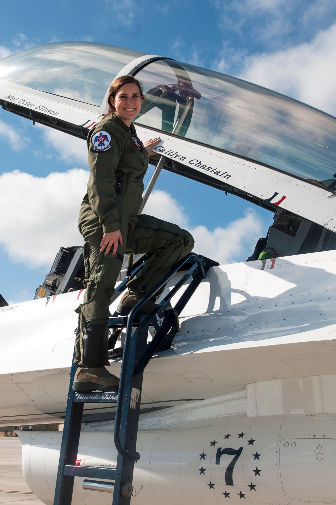 Caitlyn Chastain, a local news reporter, poses for a photo, Nov. 6, 2015, at Moody Air Force Base, Ga. Chastain rode along with the U.S. Air Force Thunderbirds during the Thunder Over South Georgia Open House. The open house brought out approximately 50,000 people from the surrounding area to see multiple static displays and performances from a wide range of aircraft. (U.S. Air Force Airman 1st Class Kathleen D. Bryant/Released)