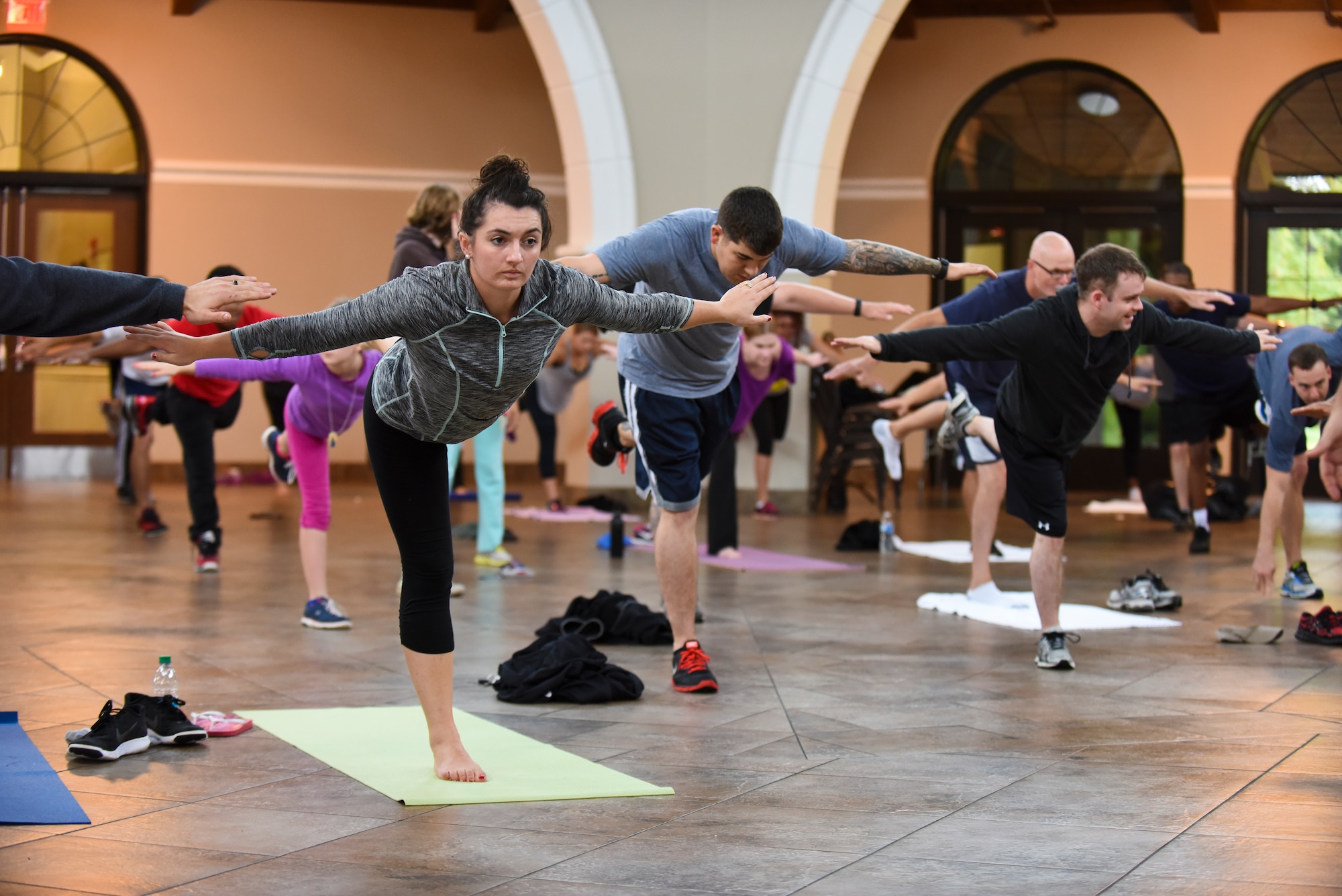 Brianne McMahon participates in yoga exercises during the USO of North Carolina Warrior Reset retreat, Nov. 3, 2015, at the Cape Fear Botanical Garden in Fayetteville, North Carolina. Service members and their families were encouraged to participate in physical activities to explore new ways of relieving stress. (U.S. Air Force photo/Senior Airman Aaron J. Jenne)