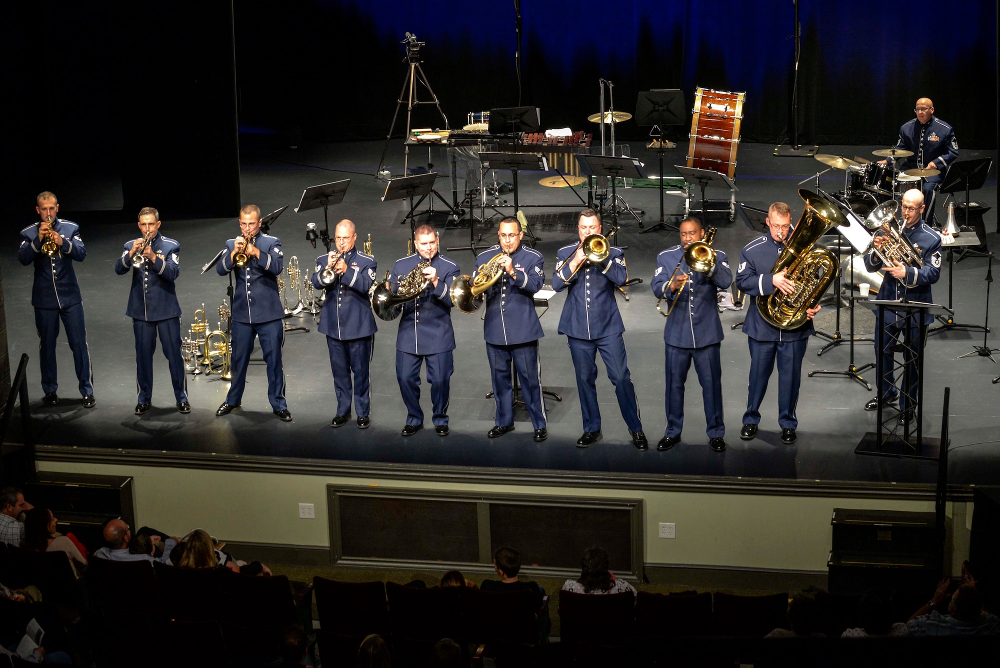 Members of the U.S. Air Force Heritage of America Band Heritage Brass ensemble play to the crowd at the Paramount Theater, Nov. 5, 2015, in Goldsboro, North Carolina. The ensemble played each military service branch’s official song, as their final number. (U.S. Air Force photo/Airman 1st Class Ashley Williamson)