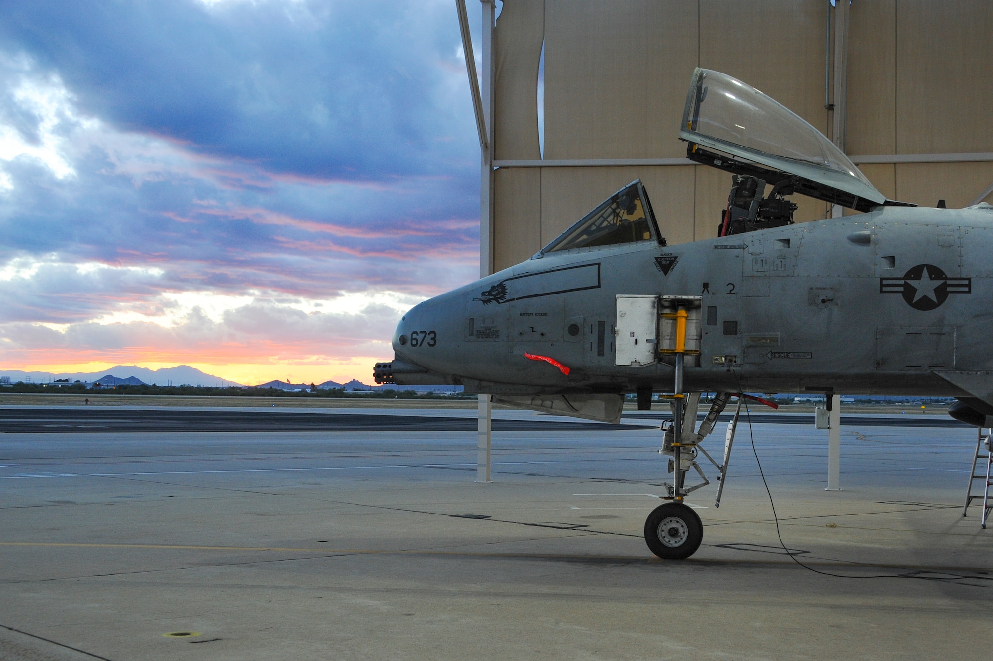 An A-10C Thunderbolt II rests under a sunshade at Davis-Monthan Air Force Base, Ariz., Nov. 4, 2015. The A-10C contains many parts that are interchangeable, including engines, main landing gear and vertical stabilizers. (U.S. Air Force photo by Airman 1st Class Ashley N. Steffen/Released)