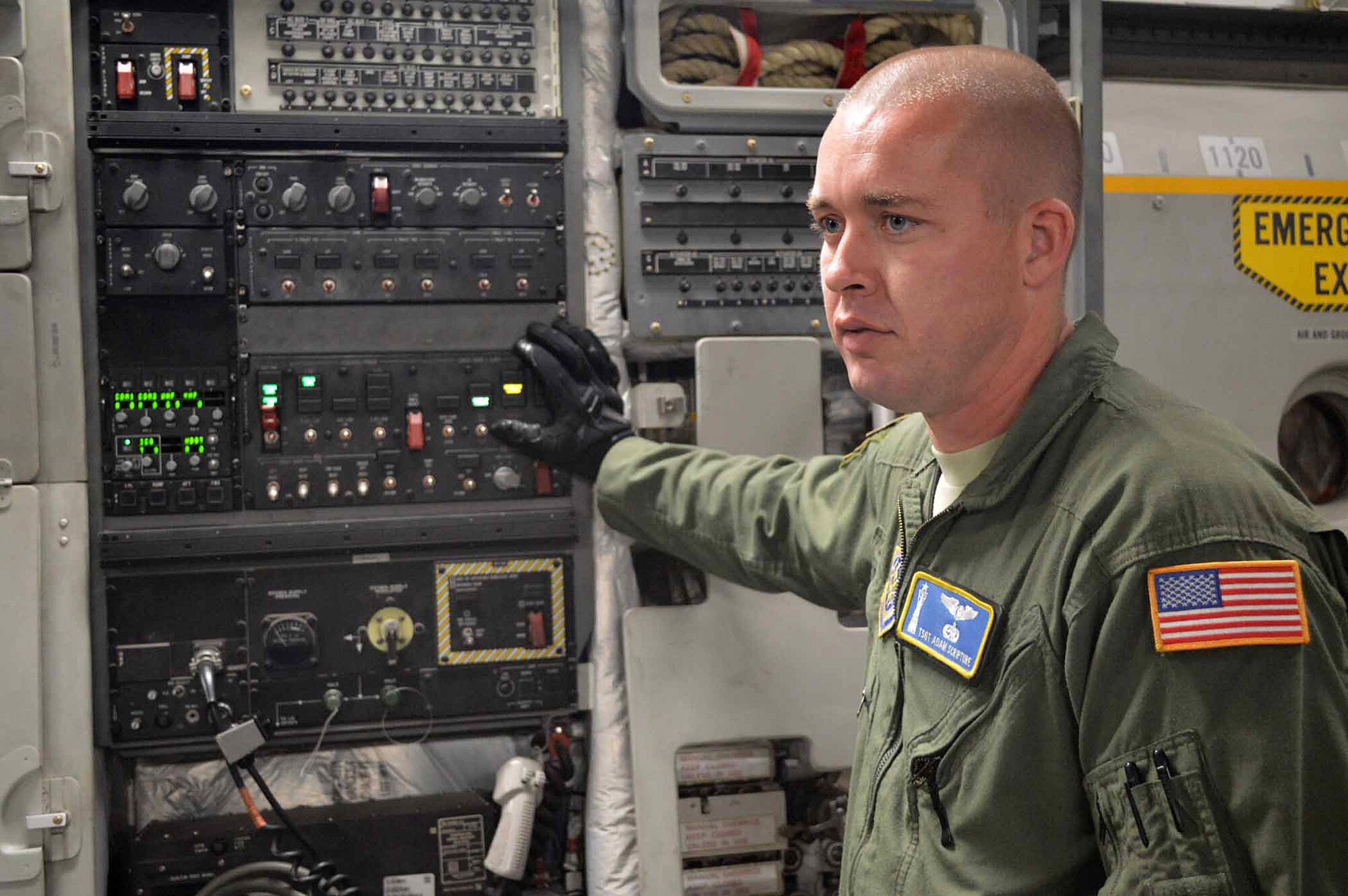U.S. Air Force Tech. Sgt. Adam Scripture, a C-17 Globemaster III loadmaster assigned to the 43rd Operations Support Squadron, lowers the cargo ramp on a C-17 aircraft in preparation for loading of U.S. Army T-11 parachutes onto the aircraft during exercise Ultimate Reach Nov.3, on Green Ramp, Pope Army Airfield, North Carolina. Eighteenth Air Force units, partnered with the Army's 82nd Airborne Division, are participating in Exercise Ultimate Reach Nov. 2-8. Ultimate Reach is an annual U.S. Transportation Command-sponsored live-fly exercise designed to exercise the ability of 18th Air Force (Air Forces Transportation) to plan and conduct strategic airdrop missions. This iteration of Ultimate Reach partners with NATO Exercise Trident Juncture, currently being held in locations across Europe. C-17 crews from Joint Base Charleston, S.C.; Joint Base Lewis-McChord, Washington; and Joint Base Elmendorf-Richardson, Alaska, will fly more than 500 Paratroopers of the 82nd Airborne Division's 2nd Brigade Combat Team across the Atlantic to conduct a joint forcible entry exercise over Zaragoza Spain. KC-10 aerial refueler crews from Joint Base McGuire-Dix-Lakehurst, New Jersey, and Travis Air Force Base, California, will provide refueling support during the mission. The exercise serves to enhance 18th Air Force's interoperability and teamwork with NATO allies and sister services. More than 5,000 U.S. service members are participating in Trident Juncture. Elements of the exercise are being conducted in Spain, Portugal, Italy, Belgium, Canada, Germany, the Netherlands, Norway and at sea. Trident Juncture is the largest NATO exercise conducted in the last 20 years and serves as an annual NATO Response Force certification exercise for 2016. Trident Juncture formally ends Nov. 6. (U.S. Air Force photo/Marvin Krause)