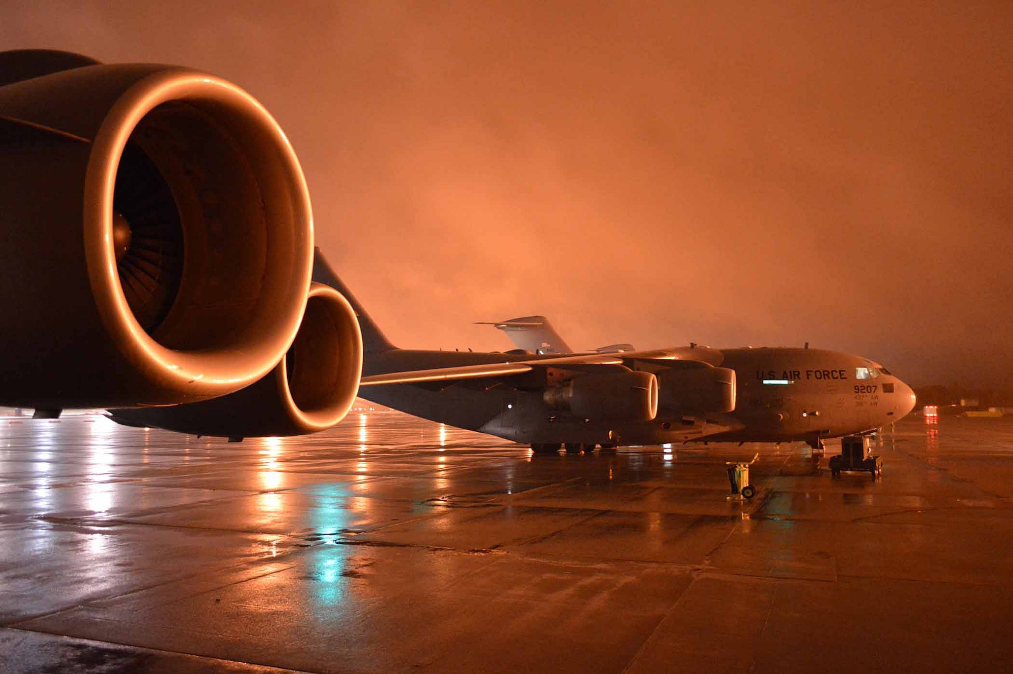 U.S. Air Force C-17 Globemaster III aircraft from Joint Base Charleston, South Carolina, Joint Base Lewis-McChord, Washington and Joint Base Elmendorf-Richardson, Alaska, are loaded with cargo and over 500 U.S. Army Paratroopers from the 2nd Brigade Combat Team, 82nd Airborne Division, during exercise Ultimate Reach Nov.3, on Green Ramp, Pope Army Airfield, North Carolina. Eighteenth Air Force units, partnered with the Army's 82nd Airborne Division, are participating in Exercise Ultimate Reach Nov. 2-8. Ultimate Reach is an annual U.S. Transportation Command-sponsored live-fly exercise designed to exercise the ability of 18th Air Force (Air Forces Transportation) to plan and conduct strategic airdrop missions. This iteration of Ultimate Reach partners with NATO Exercise Trident Juncture, currently being held in locations across Europe. C-17 crews from Joint Base Charleston, S.C.; Joint Base Lewis-McChord, Washington; and Joint Base Elmendorf-Richardson, Alaska, will fly more than 500 Paratroopers of the 82nd Airborne Division's 2nd Brigade Combat Team across the Atlantic to conduct a joint forcible entry exercise over Zaragoza Spain. KC-10 aerial refueler crews from Joint Base McGuire-Dix-Lakehurst, New Jersey, and Travis Air Force Base, California, will provide refueling support during the mission. The exercise serves to enhance 18th Air Force's interoperability and teamwork with NATO allies and sister services. More than 5,000 U.S. service members are participating in Trident Juncture. Elements of the exercise are being conducted in Spain, Portugal, Italy, Belgium, Canada, Germany, the Netherlands, Norway and at sea. Trident Juncture is the largest NATO exercise conducted in the last 20 years and serves as an annual NATO Response Force certification exercise for 2016. Trident Juncture formally ends Nov. 6. (U.S. Air Force photo/Marvin Krause)