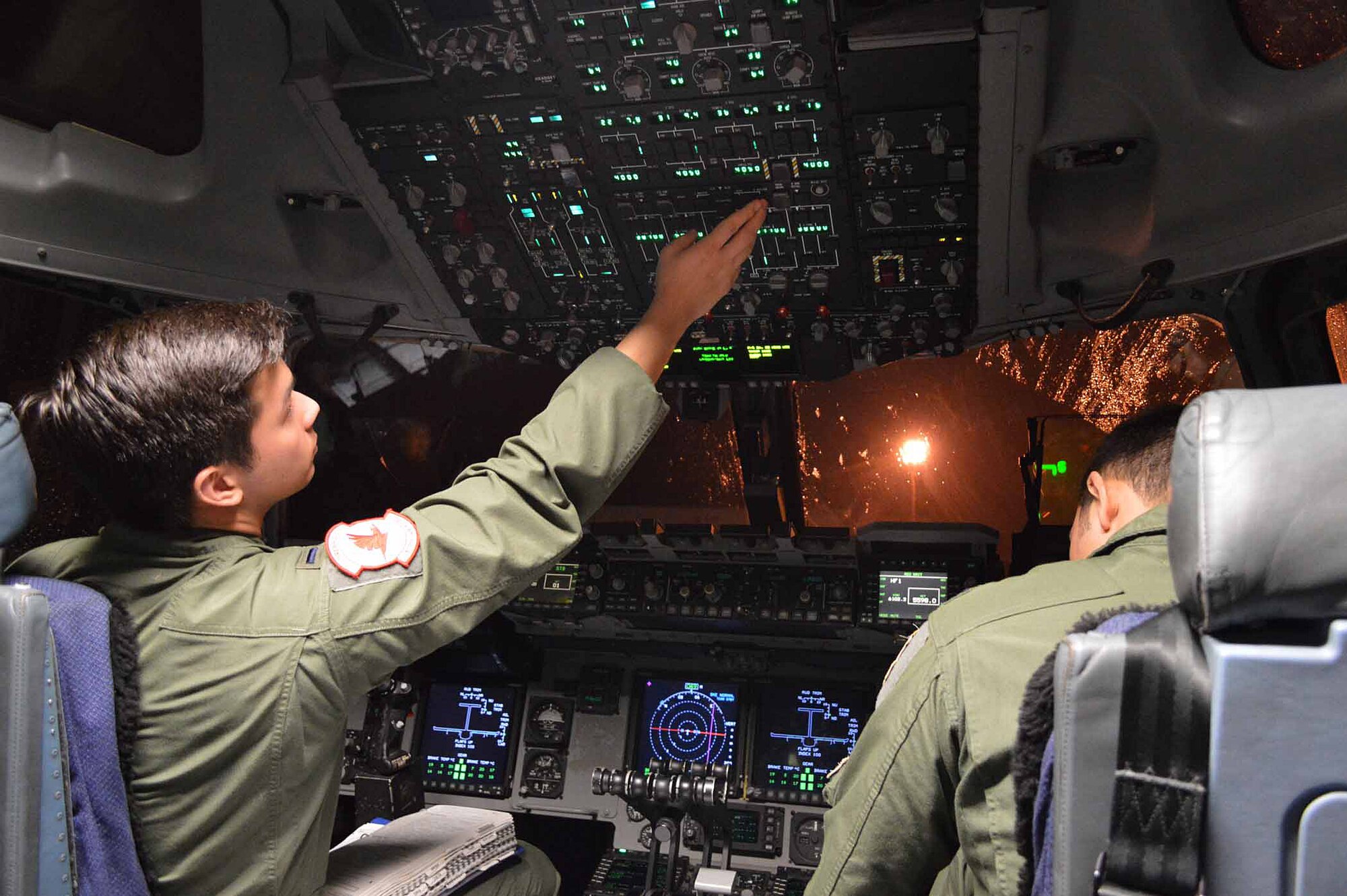 U.S. Air Force 1st Lt. Alexander Hutcheson, a C-17 Globemaster III pilot assigned to the 517th Airlift Squadron, Joint Base Elmendorf-Richardson, Alaska, conducts aircraft preflight checks during exercise Ultimate Reach Nov.3, on Green Ramp, Pope Army Airfield, North Carolina. Eighteenth Air Force units, partnered with the Army's 82nd Airborne Division, are participating in Exercise Ultimate Reach Nov. 2-8. Ultimate Reach is an annual U.S. Transportation Command-sponsored live-fly exercise designed to exercise the ability of 18th Air Force (Air Forces Transportation) to plan and conduct strategic airdrop missions. This iteration of Ultimate Reach partners with NATO Exercise Trident Juncture, currently being held in locations across Europe. C-17 crews from Joint Base Charleston, S.C.; Joint Base Lewis-McChord, Washington; and Joint Base Elmendorf-Richardson, Alaska, will fly more than 500 Paratroopers of the 82nd Airborne Division's 2nd Brigade Combat Team across the Atlantic to conduct a joint forcible entry exercise over Zaragoza Spain. KC-10 aerial refueler crews from Joint Base McGuire-Dix-Lakehurst, New Jersey, and Travis Air Force Base, California, will provide refueling support during the mission. The exercise serves to enhance 18th Air Force's interoperability and teamwork with NATO allies and sister services. More than 5,000 U.S. service members are participating in Trident Juncture. Elements of the exercise are being conducted in Spain, Portugal, Italy, Belgium, Canada, Germany, the Netherlands, Norway and at sea. Trident Juncture is the largest NATO exercise conducted in the last 20 years and serves as an annual NATO Response Force certification exercise for 2016. Trident Juncture formally ends Nov. 6. (U.S. Air Force photo/Marvin Krause)