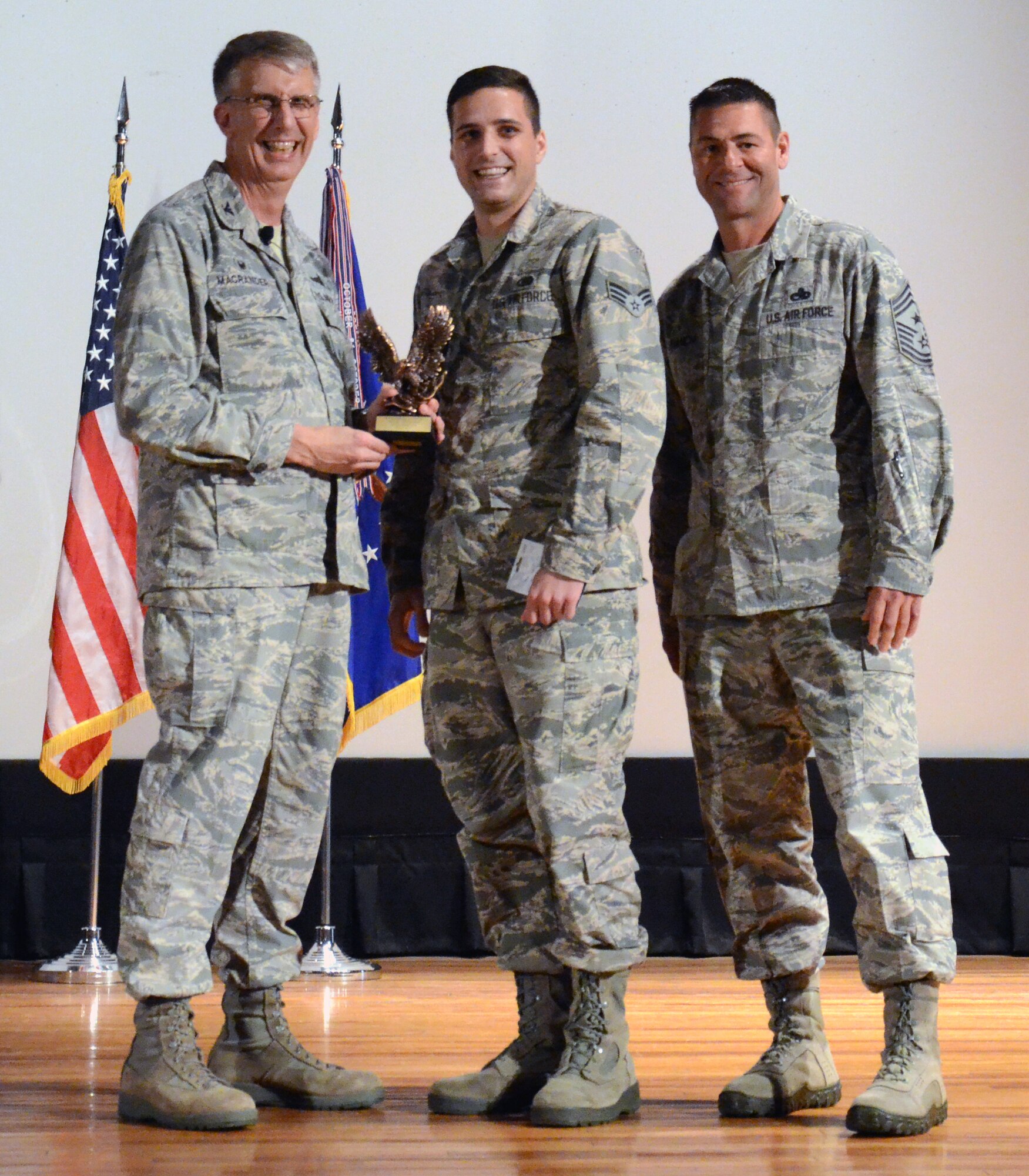 Airman of the Quarter for the first quarter of 2015 Senior Airman Charles Whorl (center), 920th Operations Support Group, along with 920th Rescue Wing Commander Col. Jeffrey Macrander (left) and wing Command Chief, Chief Master Sgt. Timothy Bianchi (right). (U.S. Air Force photo/Master Sgt. Paul Flipse) 